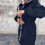 Pitkä takki, elegantti